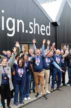 All 18 Manchester Marathon runners received a warm welcome when they returned to the design.shed in Saltney